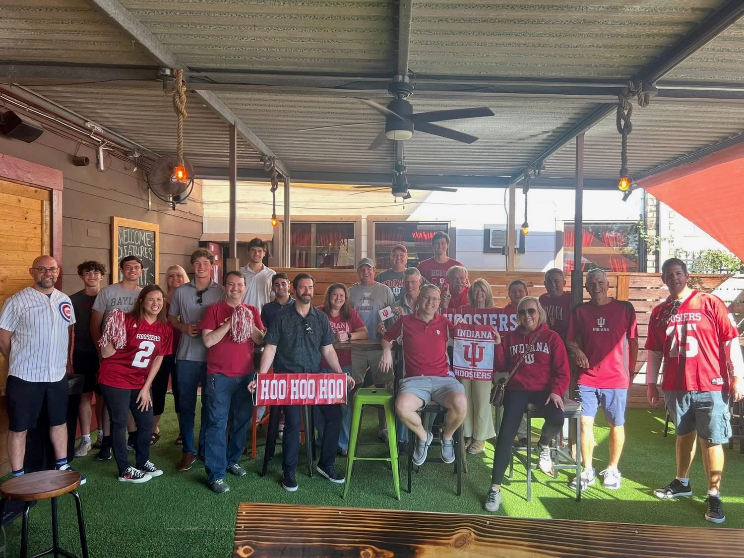 Adult Indiana fans together at an HTown Hoosiers gathering